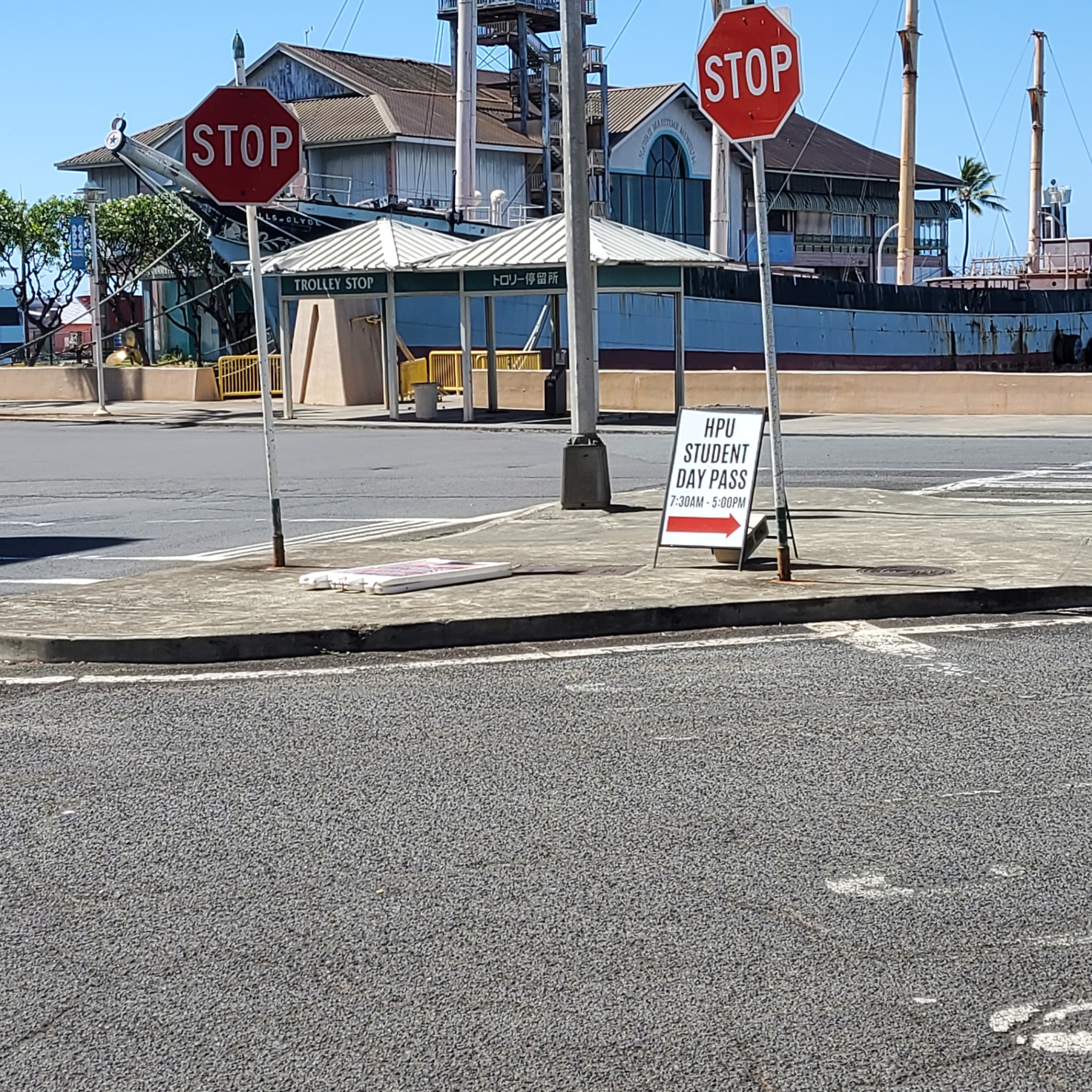 Sign flat on the sidewalk